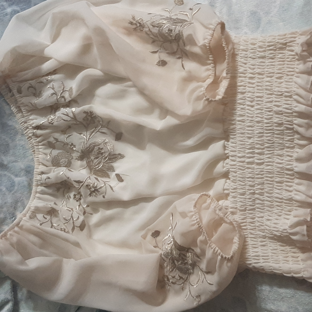 Colleen Lopez small off white